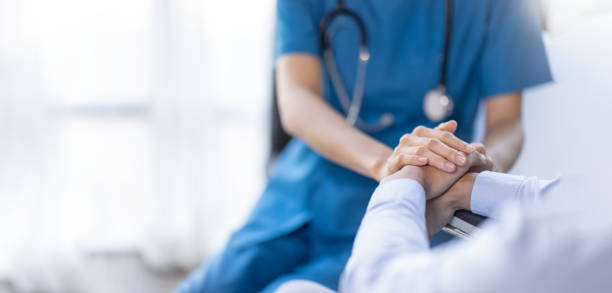 Caring healthcare professional with patient